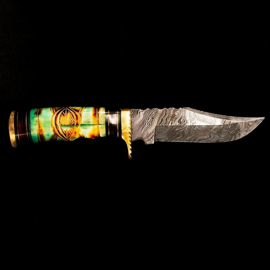 Damascus Knife: High Quality steel is utilized to forge the finest product in the world. Unique Custom Hand-Forged Damascus Steel Hunting Bowie Knife Handle Construction: Camel Bone, Colored Wood and Brass Spacers. B