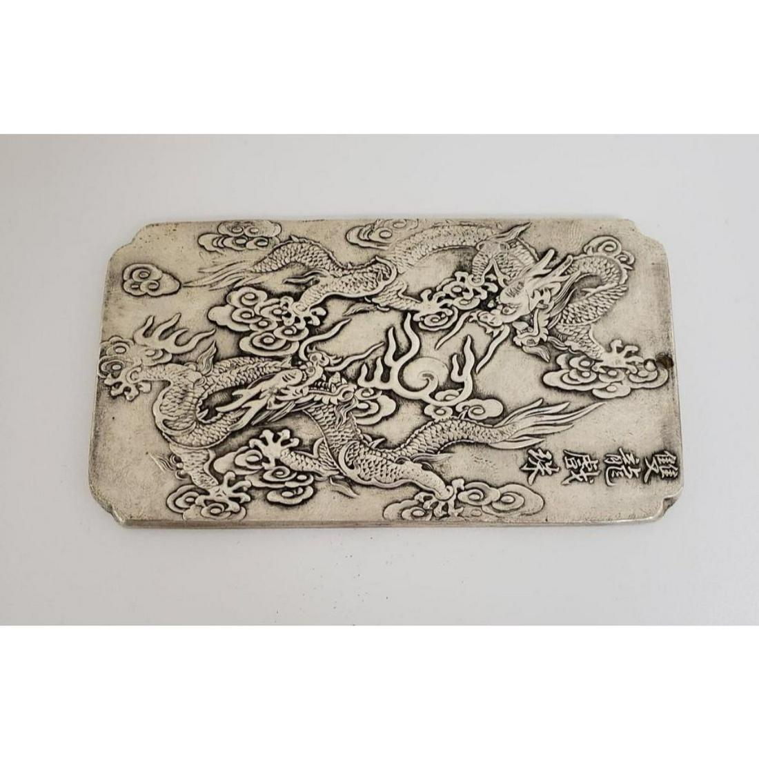 Asian Tibetan Silver Two Flying Dragons Bullion Bar: Asian Tibetan Silver Two Flying Dragons Bullion Bar. The Bullion Is Mark On The Back In Chinese. Weighing 135g. Please View Photos For Further Details.