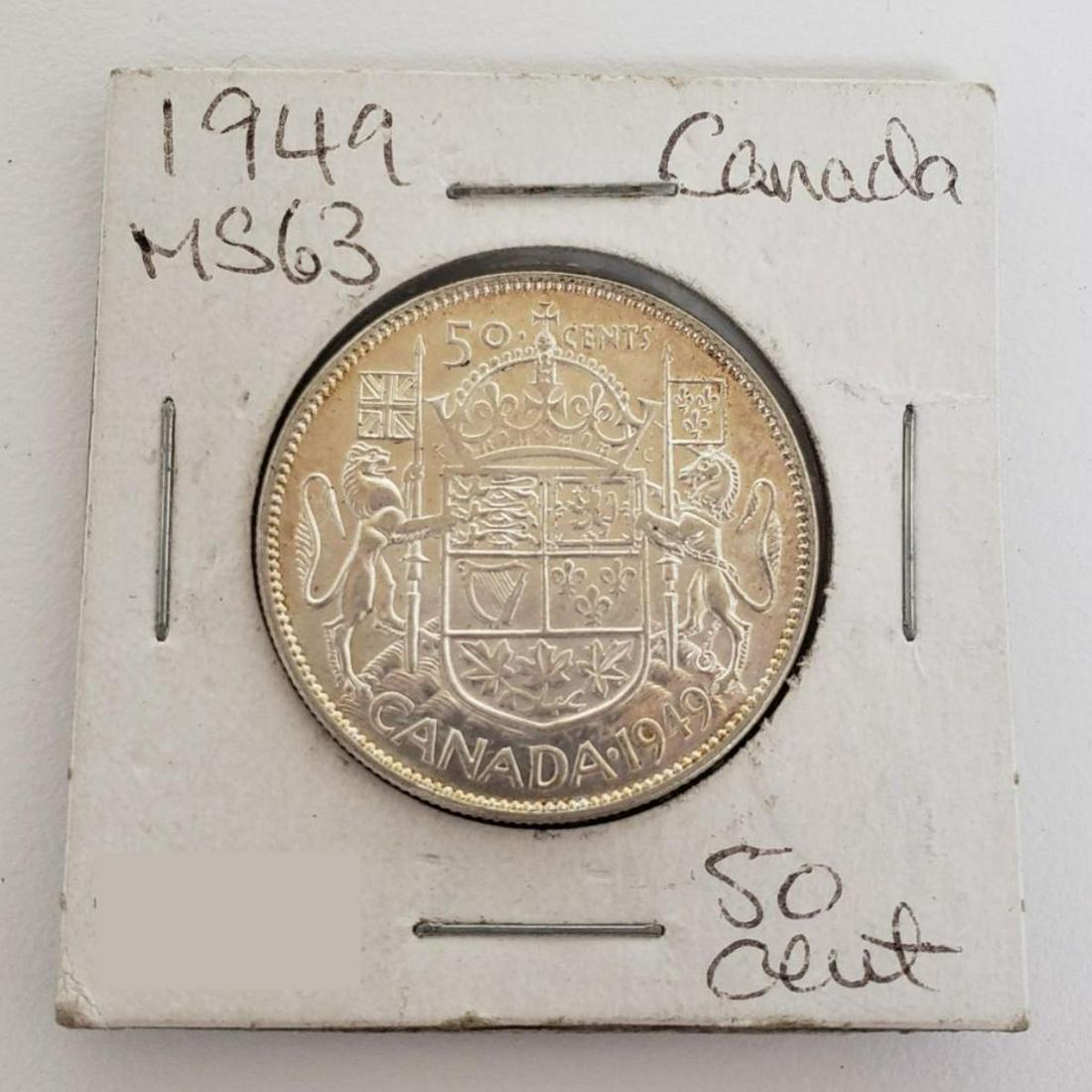 1949 George VI 50 Cent Coin: Obverse The portrait in left profile of George VI is surrounded with the inscription "GEORGIVS VI DEI GRATIA REX" (George VI, King by the grace of God) Lettering: GORGIVS VI DEI GRATIA REX Reverse A v