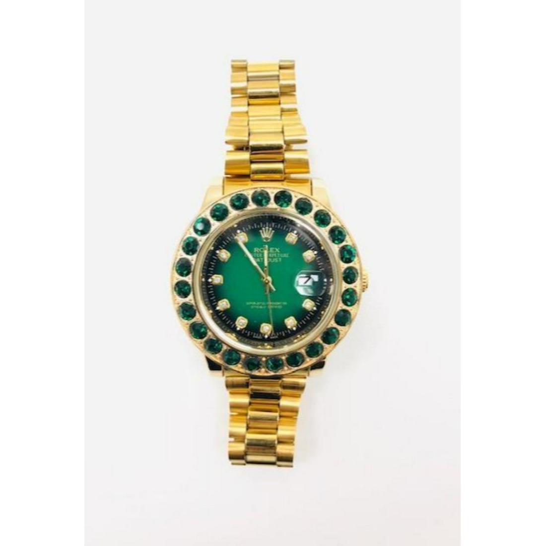 Mens Inspired by Rolex Emerald And Gold Colored Watch: Mens Inspired by Rolex Emerald And Gold Colored Inprired Watch With Chain Link Band. The Perfect Blend Of Style And Timing, This Luxury Timepiece Is Designed To Make The Modern Gentleman Look And Feel