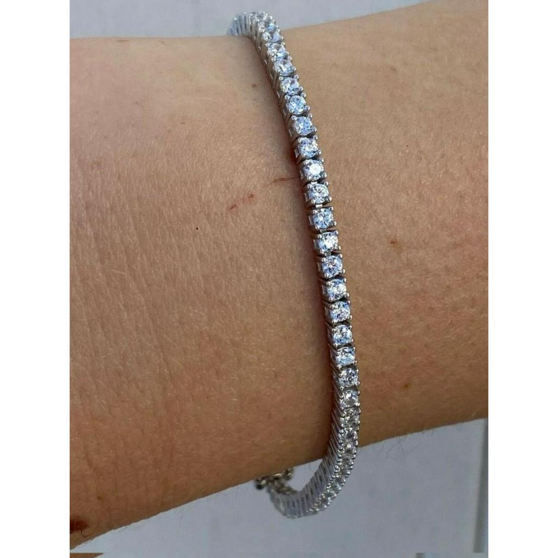 REAL 925 Sterling Silver - 2mm Tennis Bracelet Diamond: For auction is this truly radiant Sterling Silver 2mm Bracelet. Using the highest quality lab created diamonds (3ct.), finished in Rhodium with REAL Sterling Silver underneath you can be confident tha