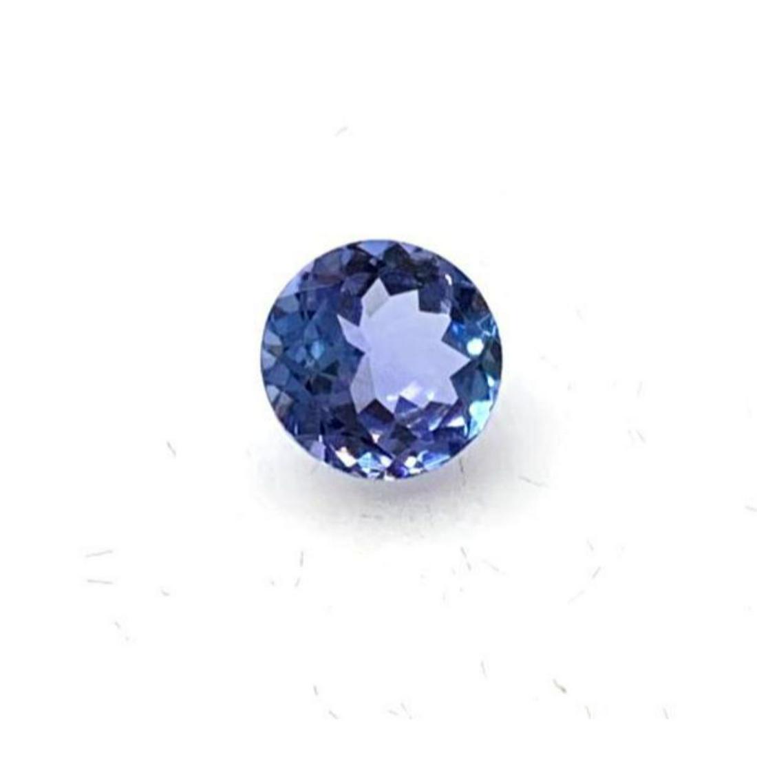 0.65ct Round Faceted Tanzanite Gemstone: Tanzanite is a rare and precious gemstone, which has been coined a 'geographical phenomenon' because of the unusual formation of the stone. The only known source this stone can be found in is a thin s
