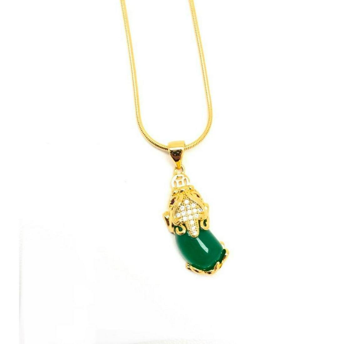 Ladies Green Jade Pixiu Pendant On 24K Gold Filled: Ladies Green Jade Pixiu Pendant On 24K Gold Filled Chain A Ladies Green Jade Pixiu Pendant On 24K Gold Filled Chain. Pendant Depicts a Baby Foo Dog Which Has Semi-Precious Stones Through The Mane & Fo
