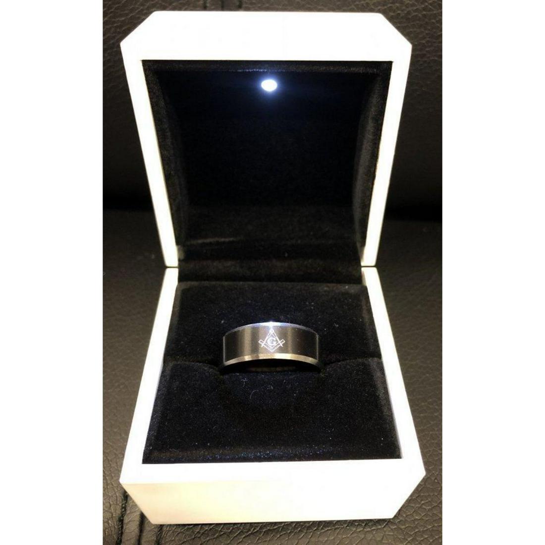 Mens Titanium Steel Black And Silver Ring, Brand New,: Mens Titanium Steel Black And Silver Ring, Brand New, Size 10. Comes in White Enameled LED Ring Box. See photos for further inspection.