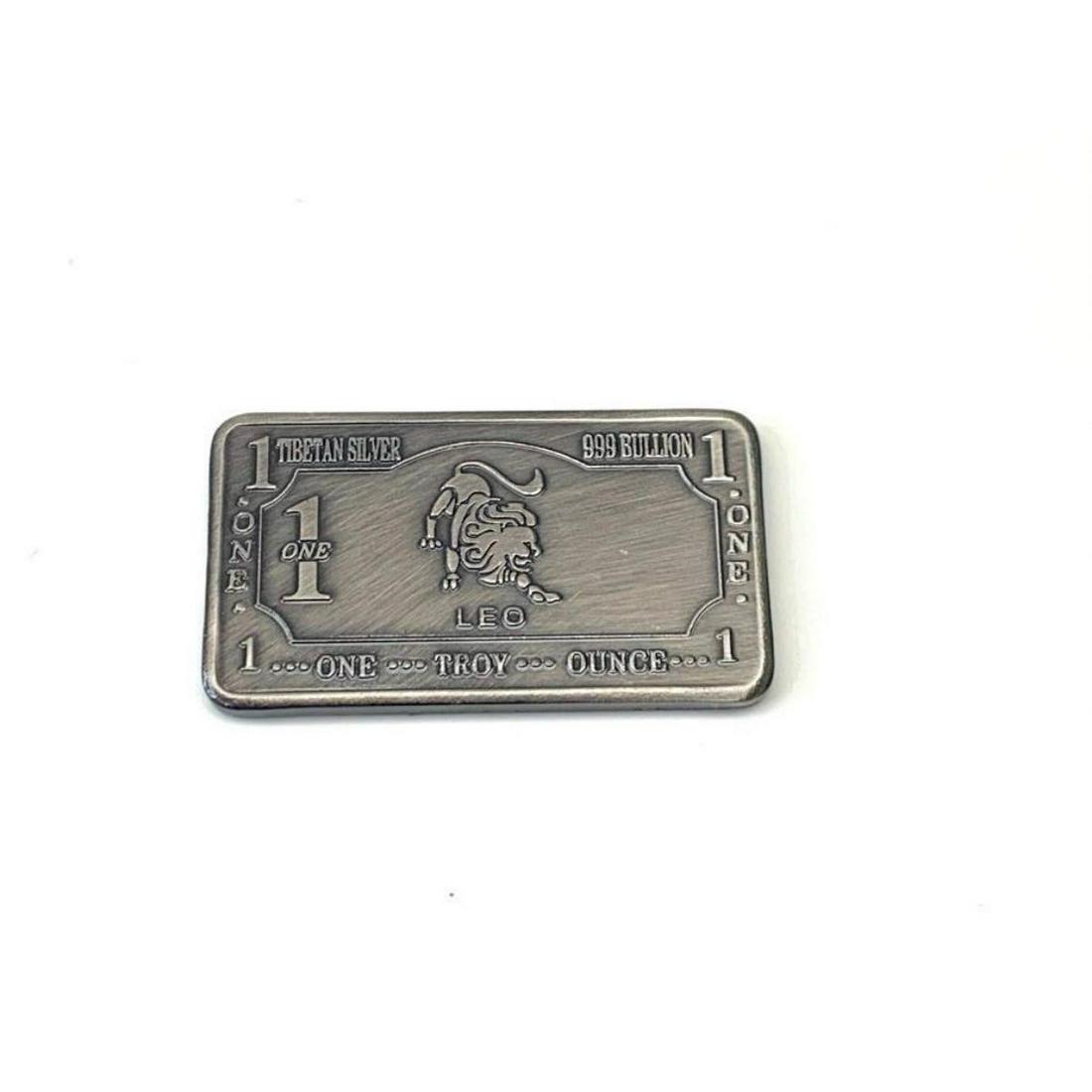 1 TROY OUNCE OF TIBETAN SILVER 999 BOULION - LEO ZODIAC: 1 TROY OUNCE OF TIBETAN SILVER 999 BULLION - LEO ZODIAC SIGN. THIS BULLION DEPICTS THE LION AND IS ONE OF THE 12 SIGNS OF THE ZODIAC. VIEW PHOTOS FOR FURTHER DETAILS.