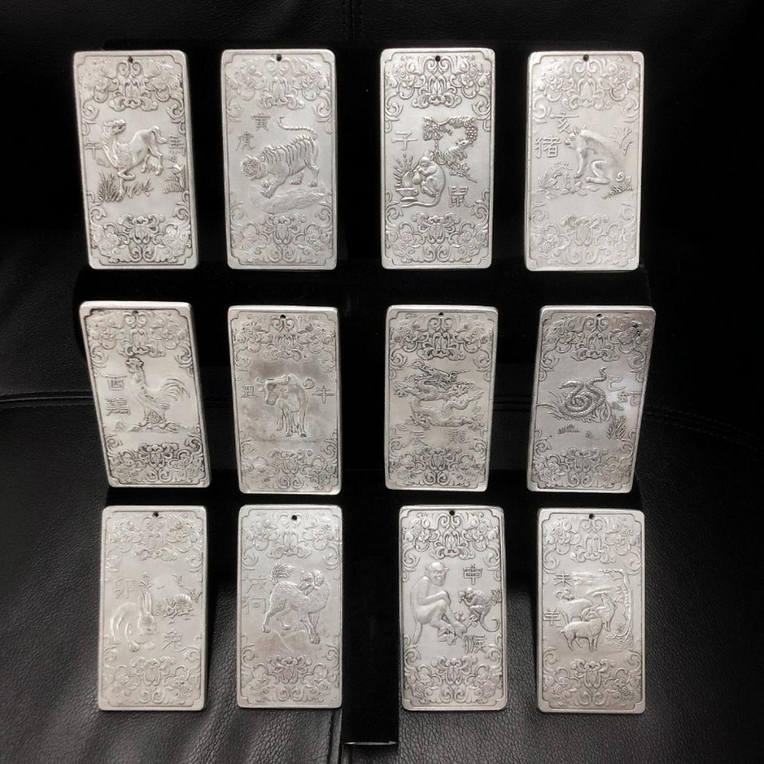 12 Zodiac Tibetan Silver Amulet Bars, Complete Set: The Complete Set Of The Chinese 12 Zodiac Tibetan Silver Bullion. This Includes All Of The Animals Of The Calendar Year. Tibetan Silver Amulet Bar Is An Excellent Collector Item. This Lot In The Aucti