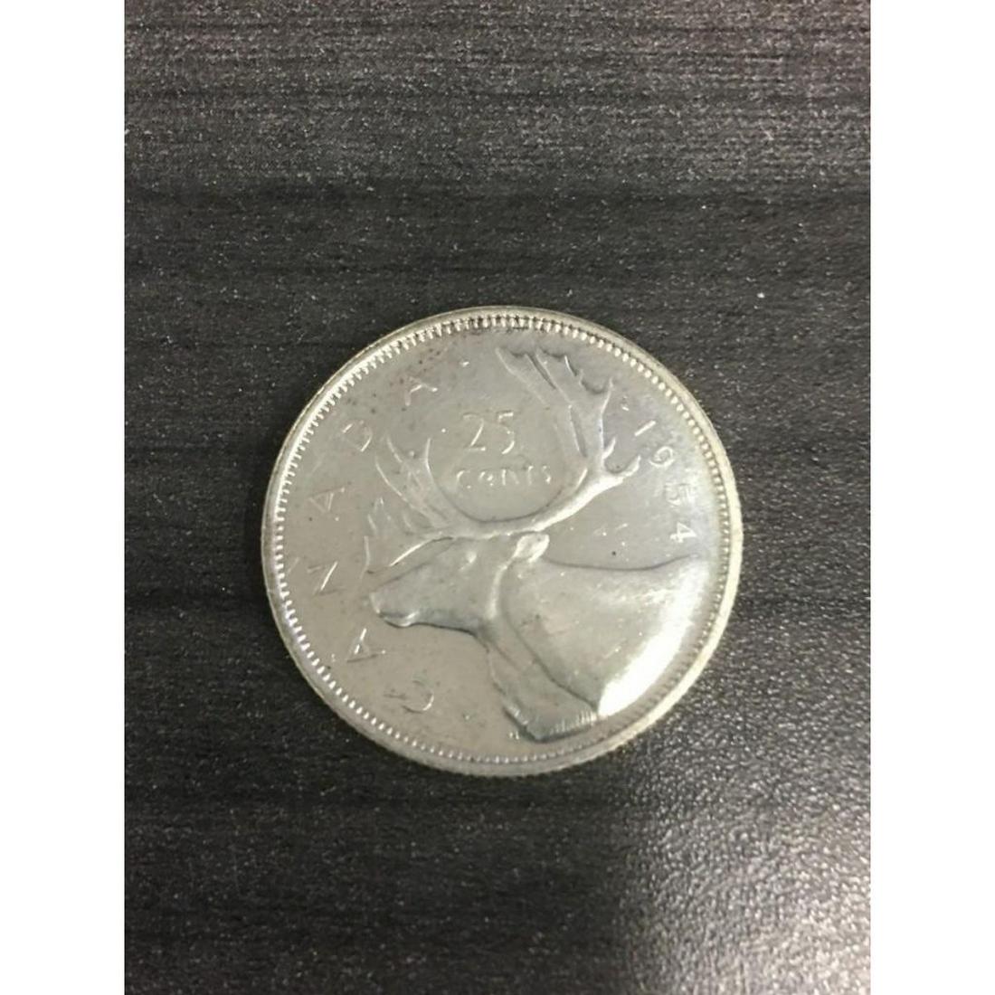 1954 80% Silver 25 Cent Canadian Coin: A 1954 80% Silver 25 Cent Canadian Coin. View Photos For Further Details.
