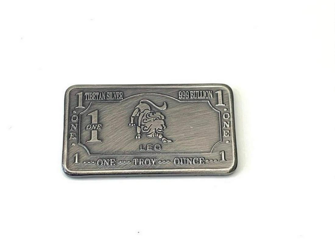 1 TROY OUNCE OF TIBETAN SILVER 999 BOULION - LEO ZODIAC: 1 TROY OUNCE OF TIBETAN SILVER 999 BULLION - LEO ZODIAC SIGN. THIS BULLION DEPICTS THE LION AND IS ONE OF THE 12 SIGNS OF THE ZODIAC. VIEW PHOTOS FOR FURTHER DETAILS.