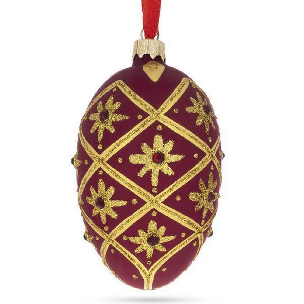 Hand-painted Gold Stars on Red Glass Egg Ornament. (1 of 2)