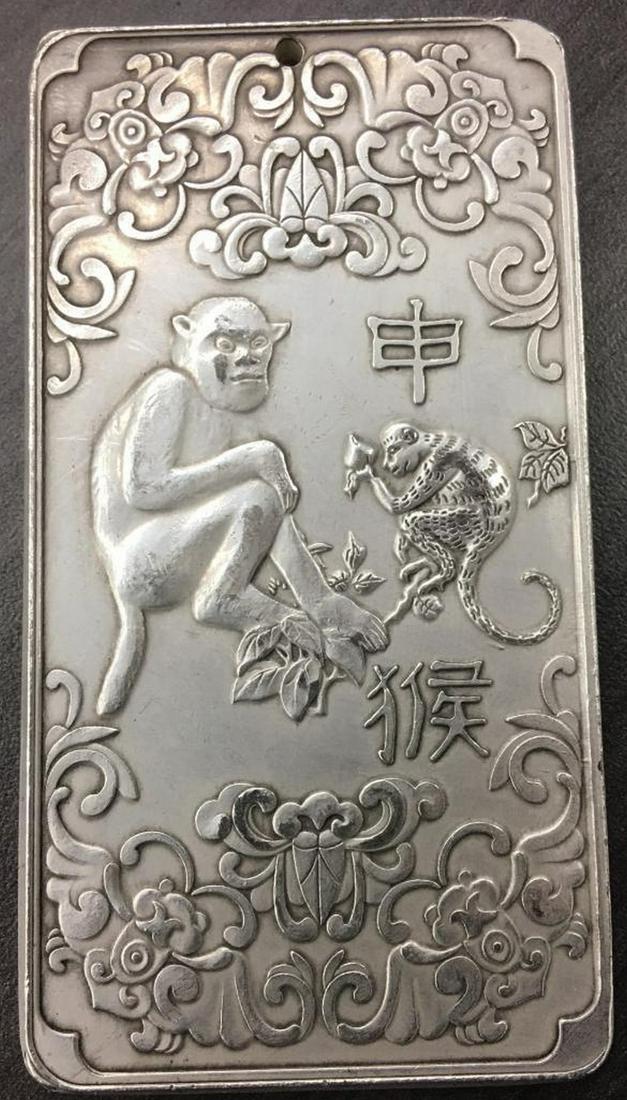 Tibetan Silver Bullion Depicting The Year Of The Monkey (1 of 2)