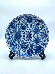 Chinese Blue and White Porcelain Plate With Hand Painted Flowers: Chinese Blue and White Porcelain Plate With Hand Painted Flowers This plate features a gorgeous hand painted flower pattern and features the qianlong mark in the center. Size: 8" diameter 