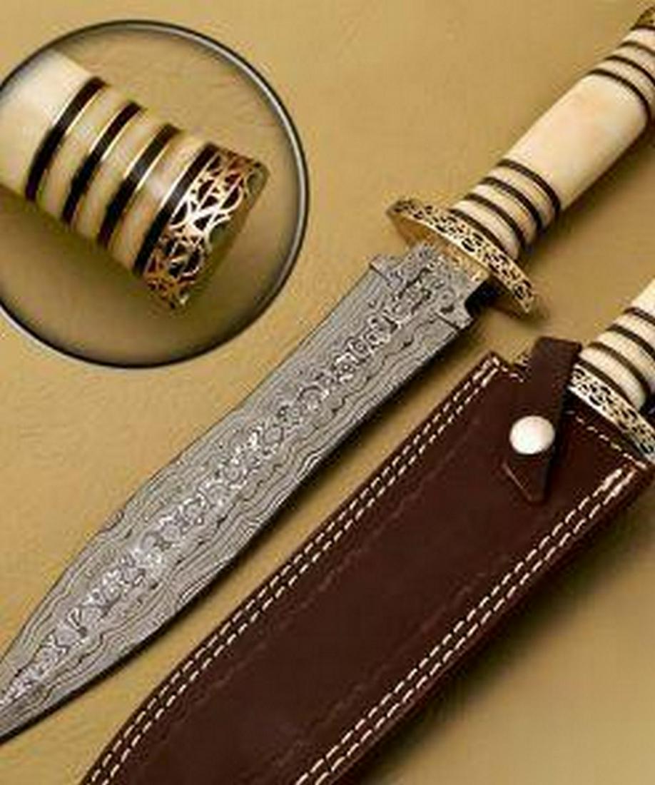 The Wretched Damascus Dagger: Custom Handmade Damascus Steel Hunting Dagger Knife Handle Camel Bone with Brass Spacer Damascus Steel Blade with 256 Layers on it. HARDNESS 56-60 H R C VERY HIGH QUALITY GENUINE LEATHER SHEATH SIZE:
