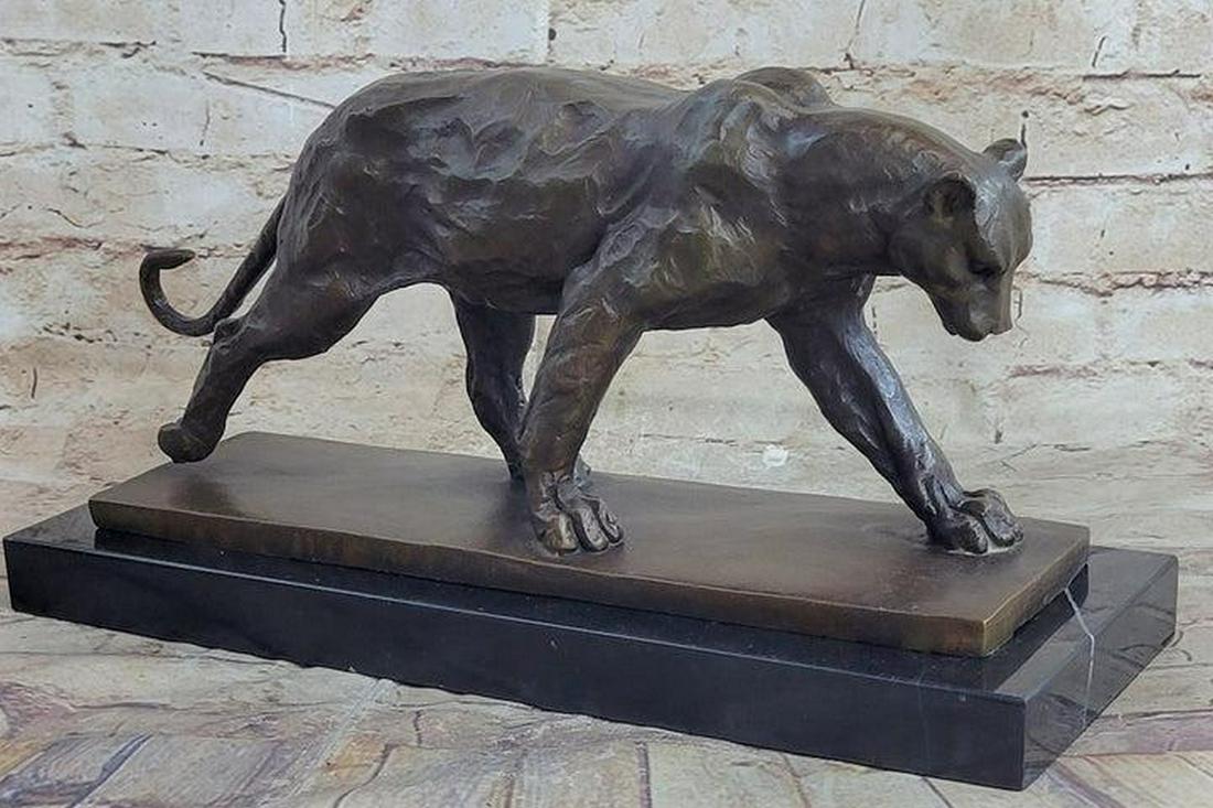 Bugatti Panther Bronze Statue: Bugatti Panther Bronze Statue You may never want to come face to face with one of these in person because once it sets its eye on you, there's nowhere to run or hide. The black Panther is one of