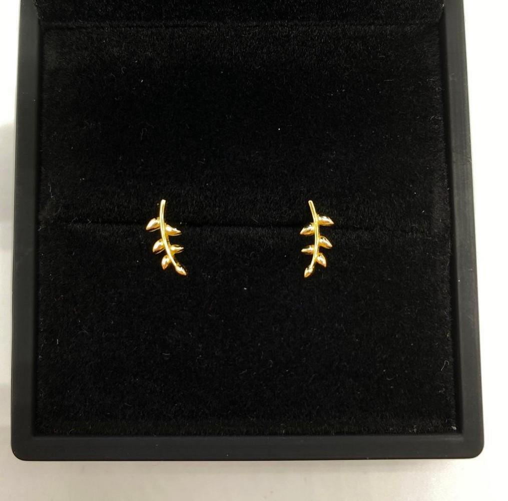 Tiny Tree Branch Yellow Gold Plated Earrings: Tiny Tree Branch Gold Plated Earrings Very simple and sweet, this set of earrings has a 925 sterling silver base plated in Yellow Gold. They come in a standard post backing. Suitable to any outfit or