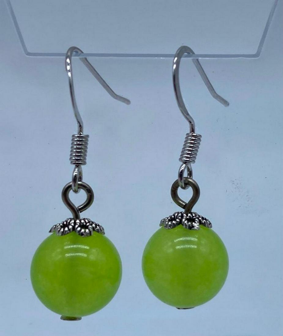Grape Jadeite Gemstone Tibet silver Ear Drop Earrings: Grape Jadeite Gemstone Tibet silver Ear Drop Earrings Dimensions: 10 mm Grape Jadeite Gemstone Description: Soft and sweet Grape Jadeite Gemstone Tibet silver Ear Drop Earrings, with hook backing. See