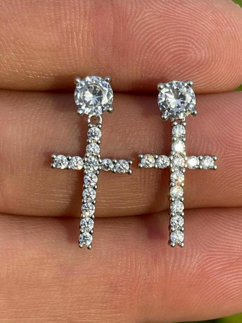 Glitzy 925 Sterling Silver And Austrian Crystal Dangle Stud Earrings: Glitzy 925 Sterling Silver And Austrian Crystal Dangle Stud Earrings A stunning set of genuine 925 Sterling Silver dangle cross studs, stamped 925. Earrings drop 1 inch. Screw back. View photos for