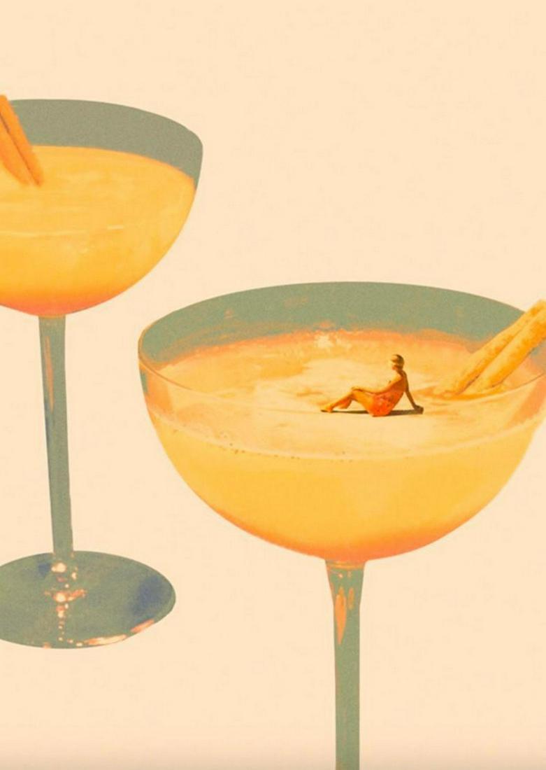 Orange Holiday in A Glass Poster: Orange Holiday In A Glass Chilling in a cocktail glass. Two orange cocktails in elegant glasses. In one of the glasses, a miniature of a human is sitting, like she's on a sunny beach. This print i