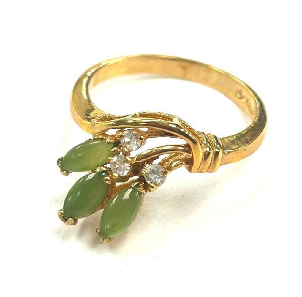 Triad of Beauty Jade and Austrian Crystal 18KTGP Ring Size 7: One of a Kind Jade and Austrian Crystal Gemstone Ring. Distinctive and unique green Jade stone surrounded by Austrian crystals on a 18KTGP Band.Green Jade is believed to improve kidney and heart funct