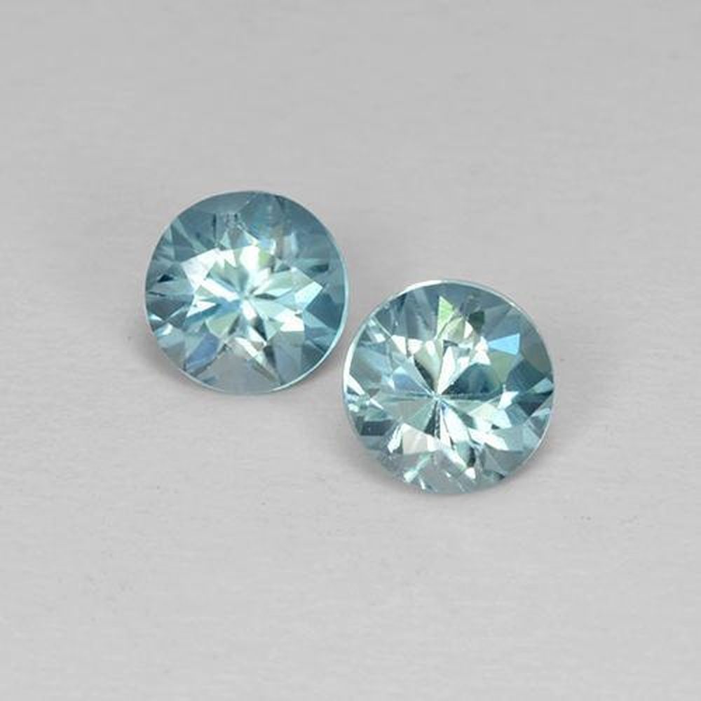 1ct Diamond Cut Light Blue Zircons: 1ct Diamond Cut Light Blue Zircons This lot contains 2 diamond-cut Zircon stones, each at 0.52ct Raw Dimension: 4.5 x 4.5mm Total Carat Weight: 1.03ct Treated: Yes, heat treatment has been use