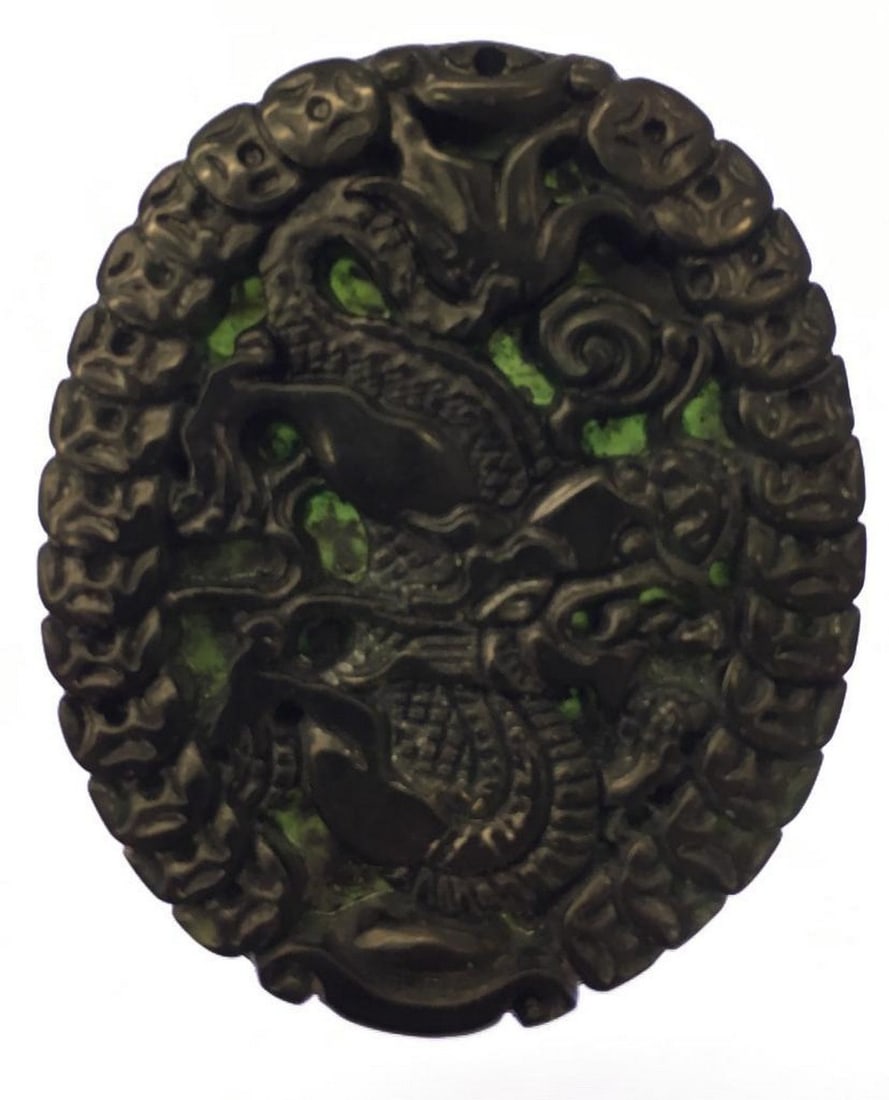 Asian Green Jade Carved Dragon Medallion: An Asian Green Jade Carved Dragon Medallion. In Chinese Culture The Dragon Symbolizes Strength and Power. View Photos For Further Details.