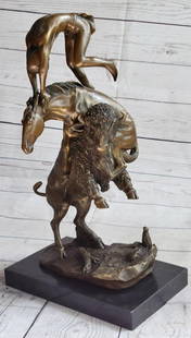 Frederic Remington Buffalo Horse Bronze Sculpture Western American Artist Art: Experience the raw power and captivating symbolism in this mesmerizing bronze abstract representation. Crafted with meticulous detail, it depicts the primal act of taming the horse and buffalo in thei