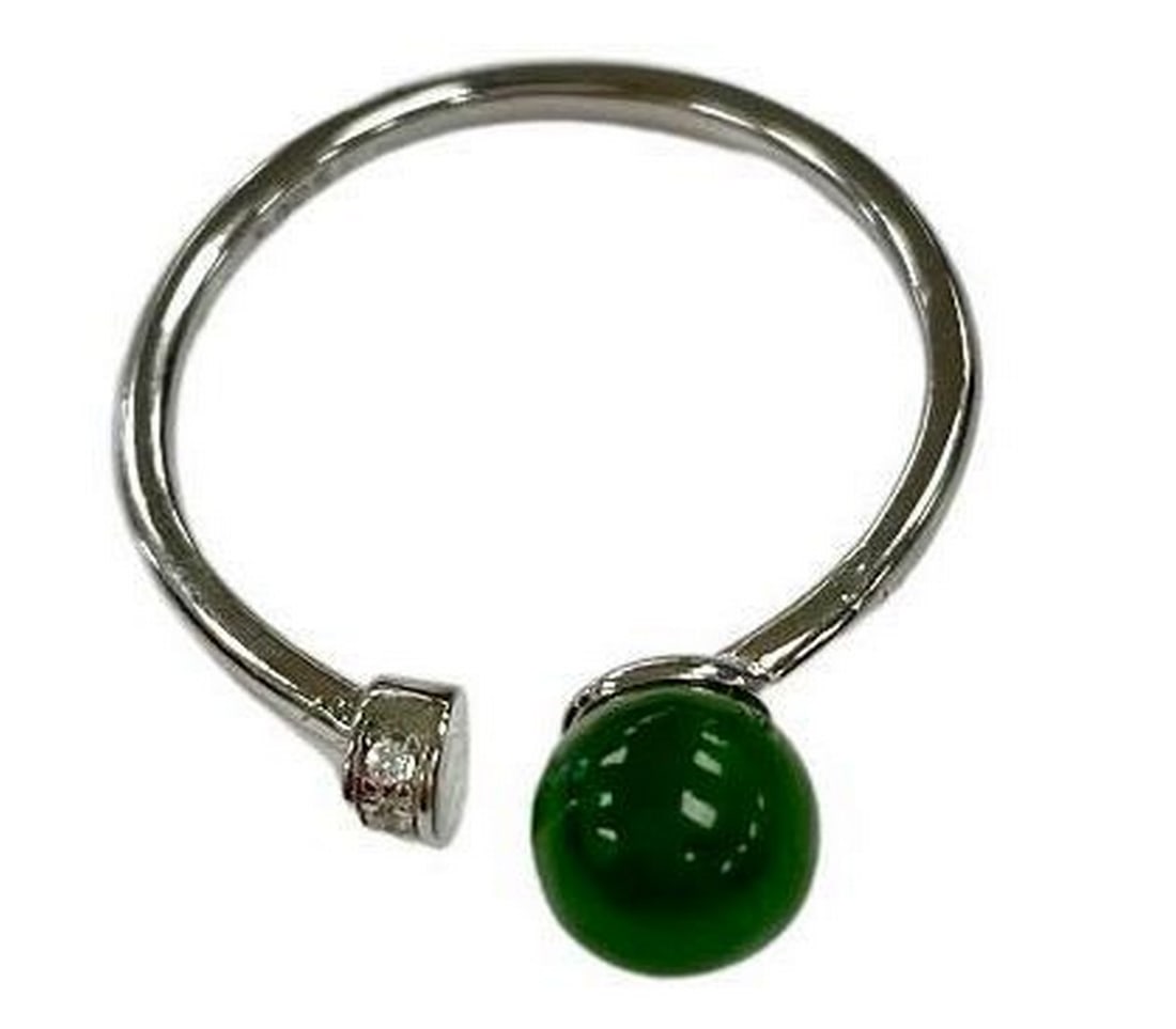 Dazzling Jade Ball Open Band Ring: Dazzling Jade Ball Open Band Ring A beautiful Jade bead is set across from a band of cubic zirconia crystals, on either end of this easily-adjustable sterling silver ring. A smart and simple modern de