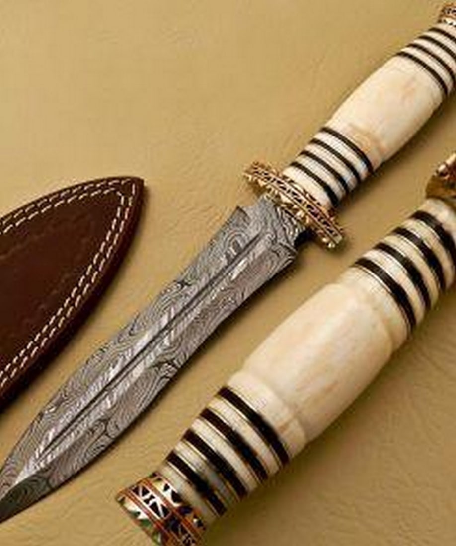 The Recruits Damascus Dagger: Custom Handmade Damascus Steel Dagger Hunting Dagger Knife Handle Camel Bone with Brass Spacer Damascus Steel Blade with 256 Layers on it. HARDNESS 56-60 H R C VERY HIGH QUALITY GENUINE LEATHER SHEATH