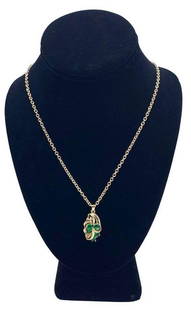 Ladies Yellow Gold Plated Green Swarovski Crystal Pendant & Chain: Ladies Yellow Gold Plated Green Swarovski Crystal Pendant & Chain. Swarovski Crystals are ruled by the Moon. The stones can represent cleanliness, purity, unity, innocence. As well, used to estab