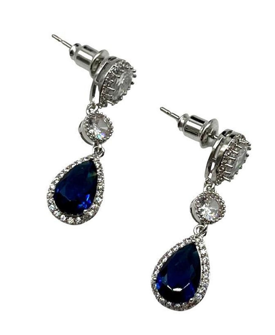 Luxurious 925 Sterling Silver Drop Earrings: Luxurious 925 Sterling Silver Drop Earrings These earrings feature a sapphire cz in addition to Austrian crystal details. Set in 925 sterling silver with a stud backing. View photos for further detail