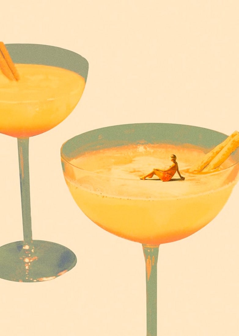 Holiday In A Glass Poster Print: Holiday In A Glass Poster Print Two orange cocktails in elegant glasses. In one of the glasses, a miniature of a human is sitting, like she's on a sunny beach. This print is both elegant and adds