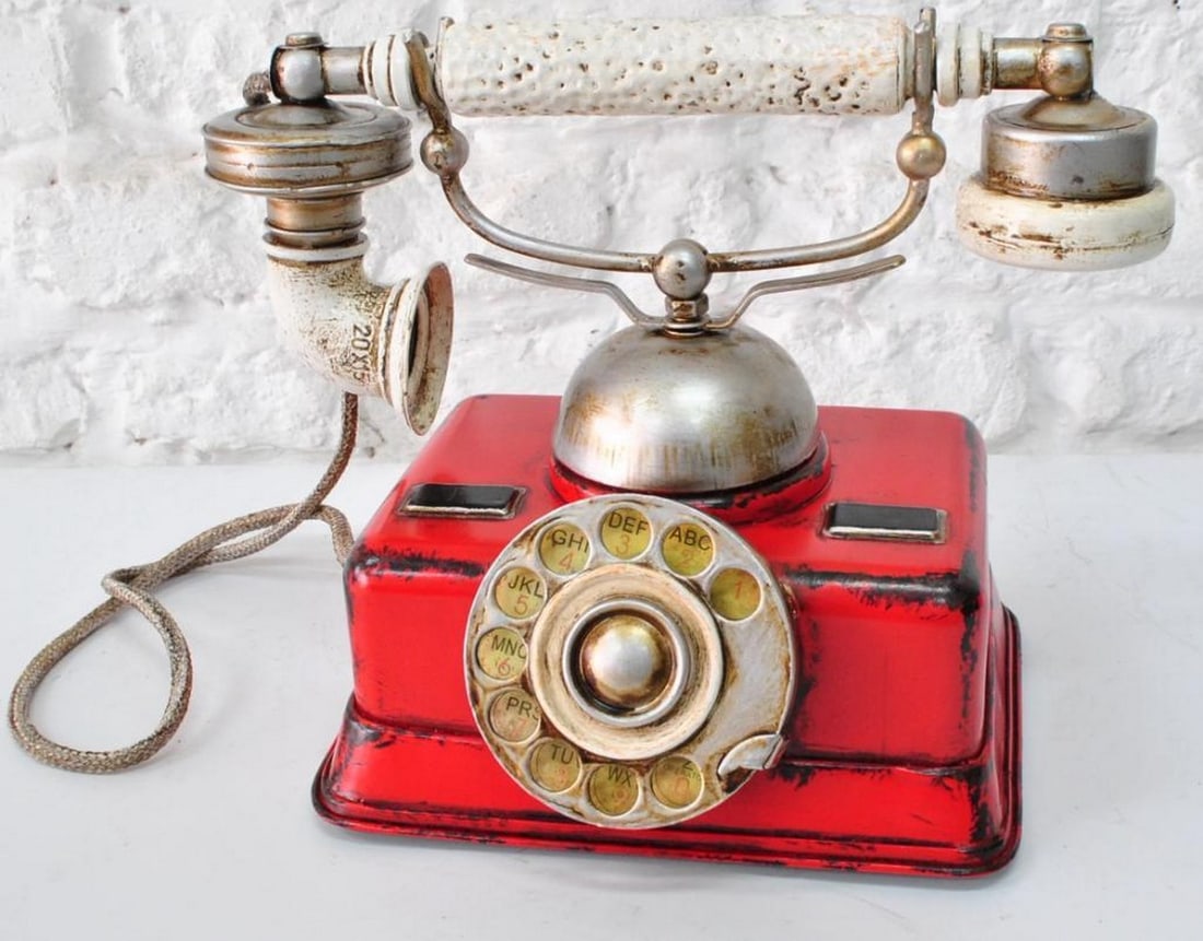 Antique Reproduction Red German Rotary Dial Phone Die Cast Figurine: Antique Reproduction Red German Rotary Dial Phone Die Cast Figurine Beautifully handmade and so each piece is a unique collectible and show piece for your home! Total Dimensions: Height 8" x Width