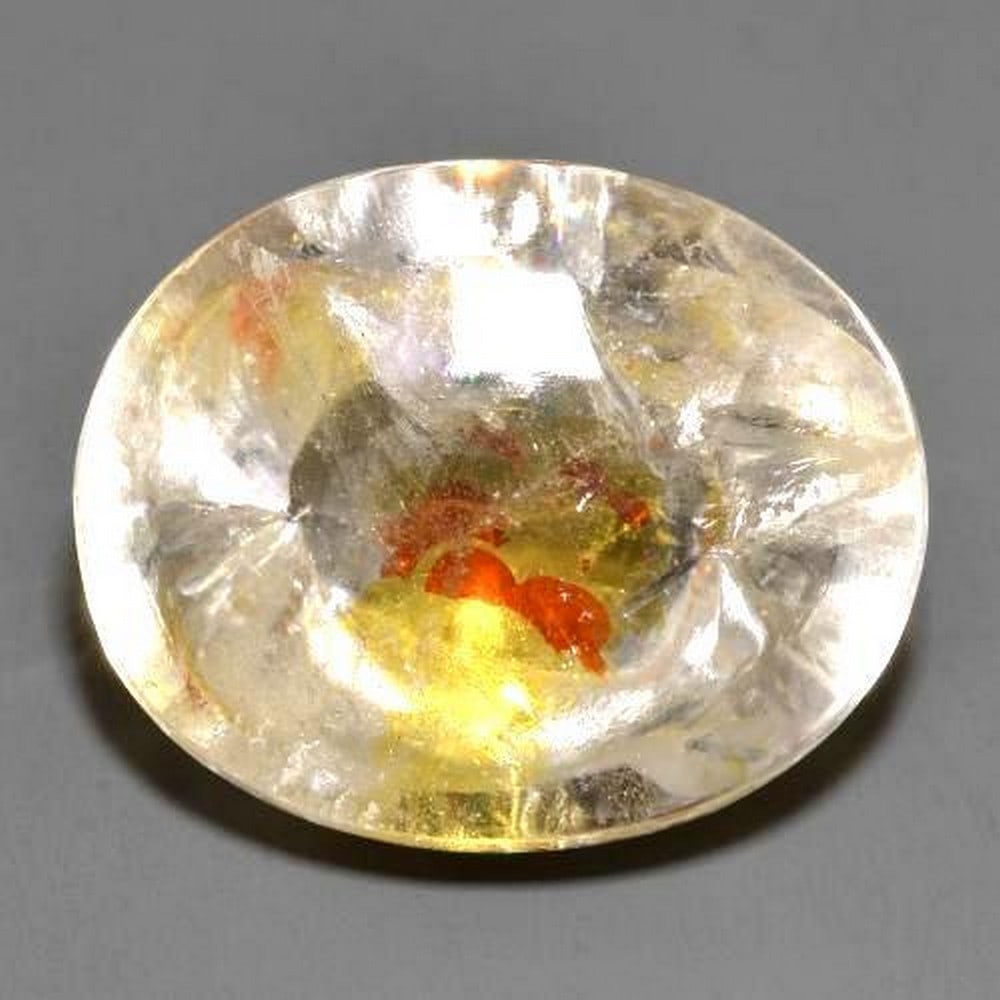 29.68ct Oval Cabochon Brazilian "Ice Rock" Multicolor Quartz Containing Marcasite: 29.7ct Oval Cabochon Multicolor Brazilian Quartz With Marcasite The size of the gemstone is good for a center-stone in a pendant. Size: 22.63 x 18.43 x 12.05mm Shape: Oval Cabochon Colour: Multicolour