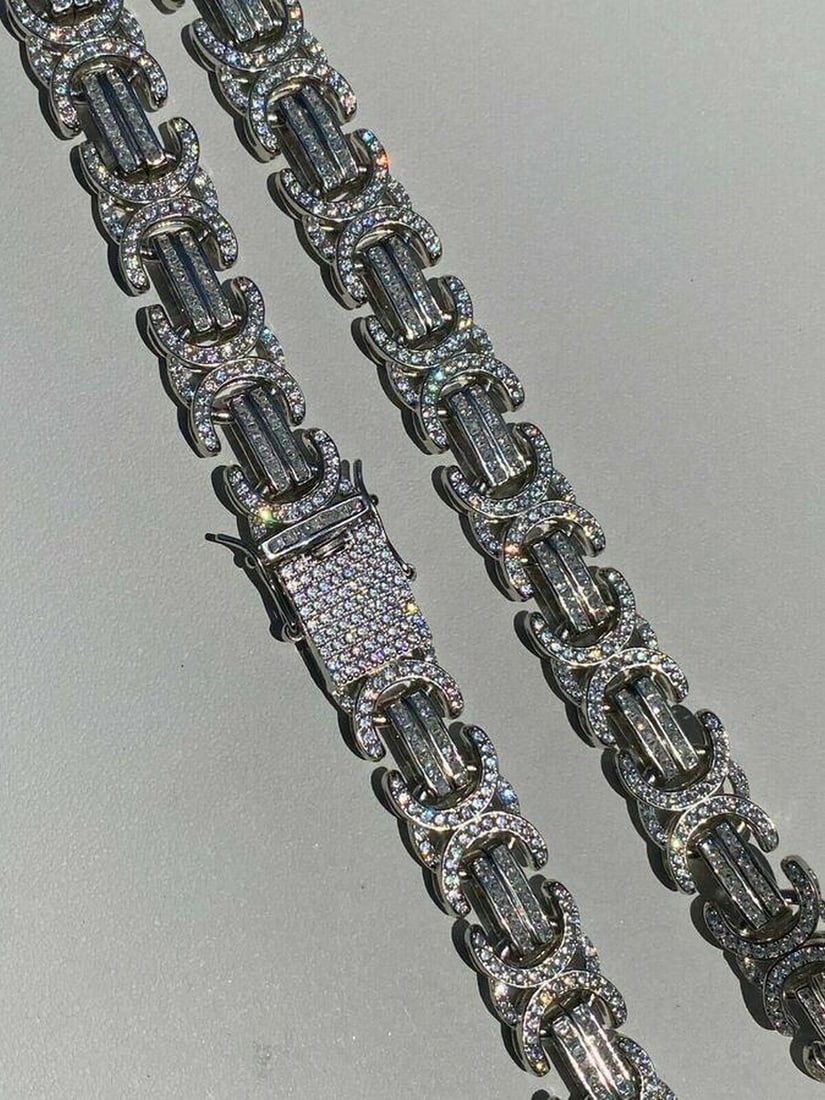 Men's Custom 14mm Wide Byzantine Custom 925 Designed Encrusted Link Chain: Men's 14mm Wide Byzantine Custom Designed Link Chain. A Very Uniques Custom Designed Pattern. Fully flooded out for an iced look That Is Certain To Catch People's Eye At Any Event Or Party. Ap