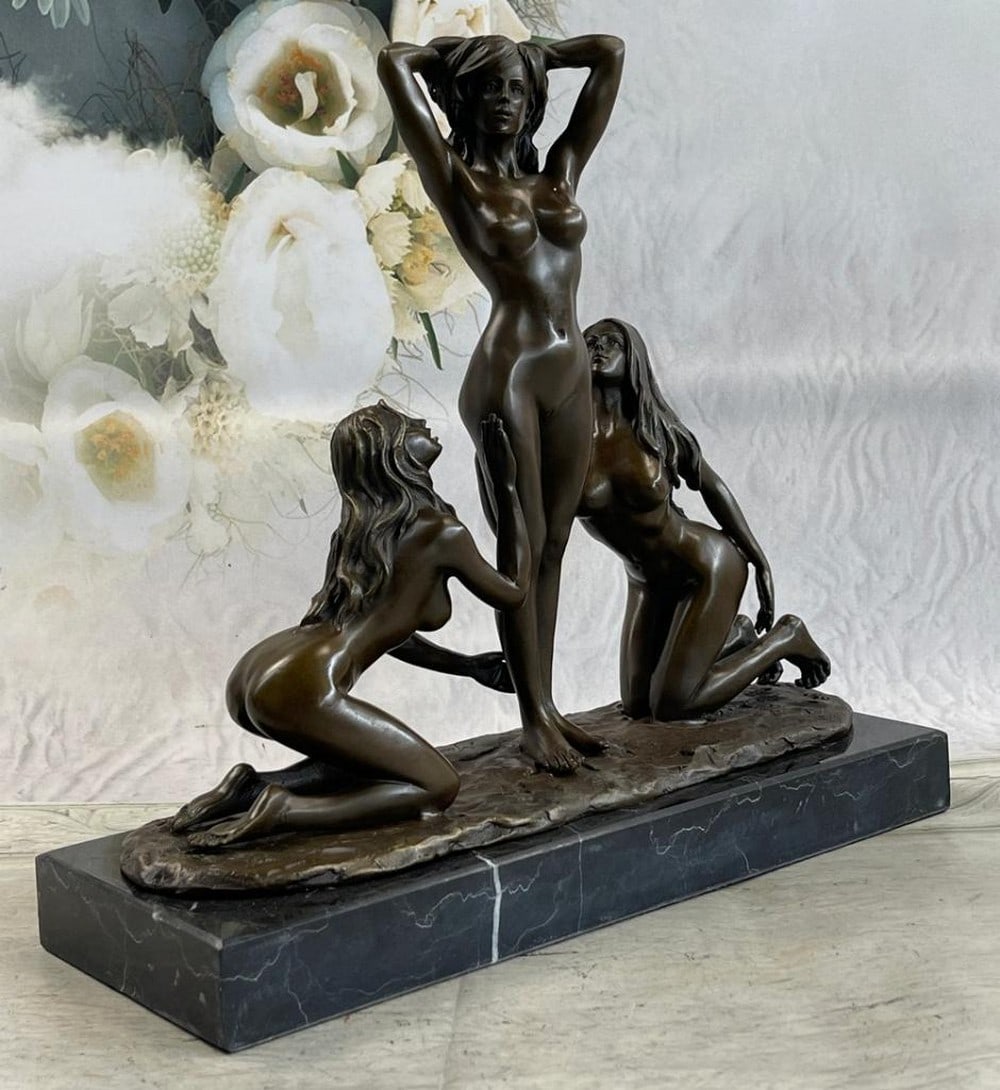 Three Nude Women Original Bronze Sculpture by Mavchi - 12" x 12.5": Three Nude Women Original Bronze Sculpture by Mavchi - 12" x 12.5" This stunning bronze sculpture, "Three Nude Women," captures the essence of feminine beauty in a graceful and elegant