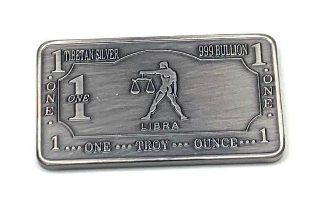 1 Troy Ounce Tibetan Silver 999 Bullion- Libra Zodiac Sign: 1 Troy ounce Tibetan silver 999 bullion- Libra Zodiac sign. 32g, 5cm in Length, 2.8cm in Width, 3mm in Thickness. This beautifully crafted piece embodies the grace, balance, and harmony associated wit