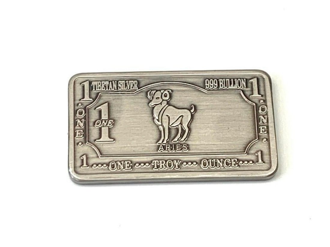 1 Troy Ounce Tibetan Silver 999 Bullion- Aries Zodiac Sign: 1 Troy ounce Tibetan silver 999 bullion- Aries Zodiac sign. Weighing 32g, 5cm in Length, 2.8cm in Width, 3mm in Thickness. This striking piece captures the boldness and vitality associated with Aries,