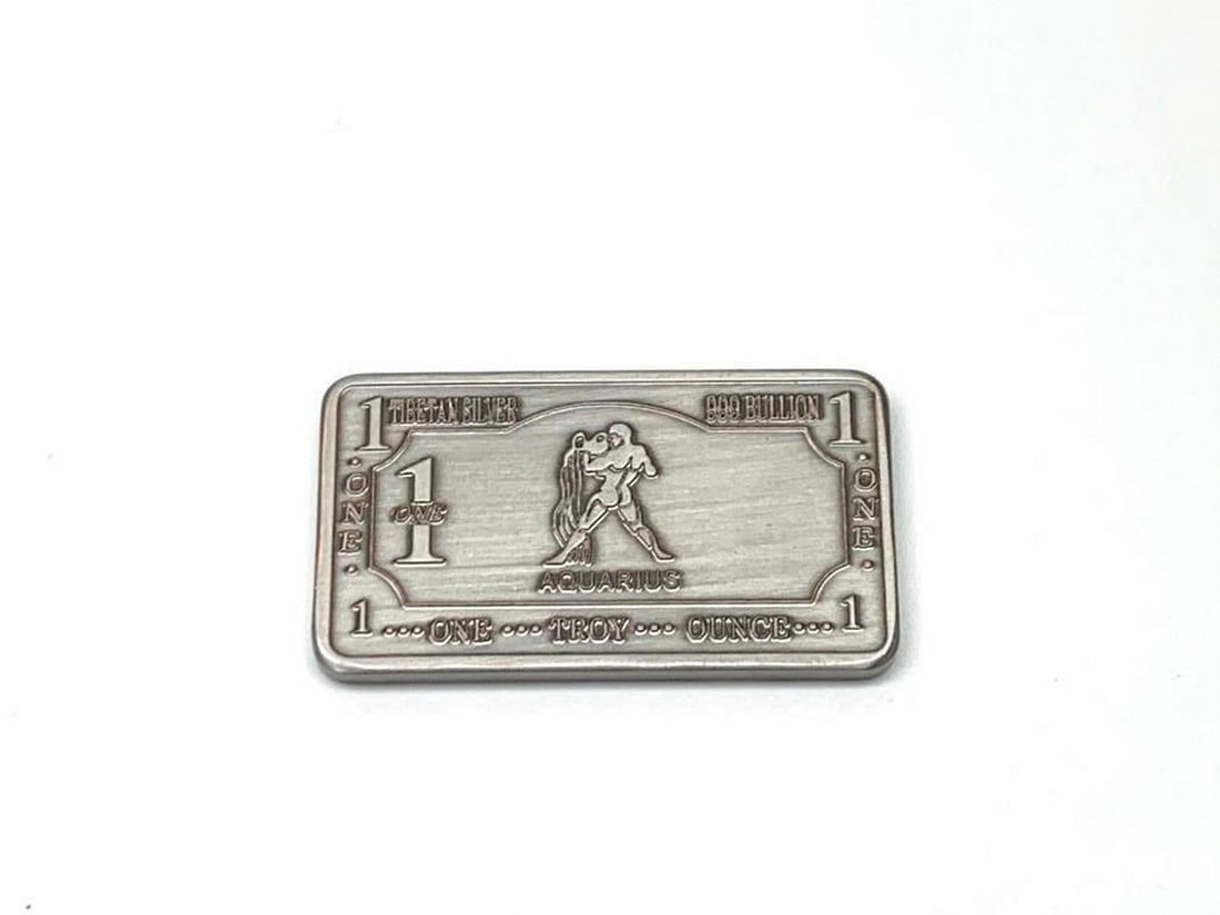1 Troy Ounce of Tibetan Silver 999 Bullion- Aquarius Zodiac Sign: 1 Troy ounce of Tibetan silver 999 bullion- Aquarius Zodiac sign. Weighing 32g, 5cm in Length, 2.8cm in Width, 3mm in Thickness. Aquarians are always running little tests. They live their lives as one