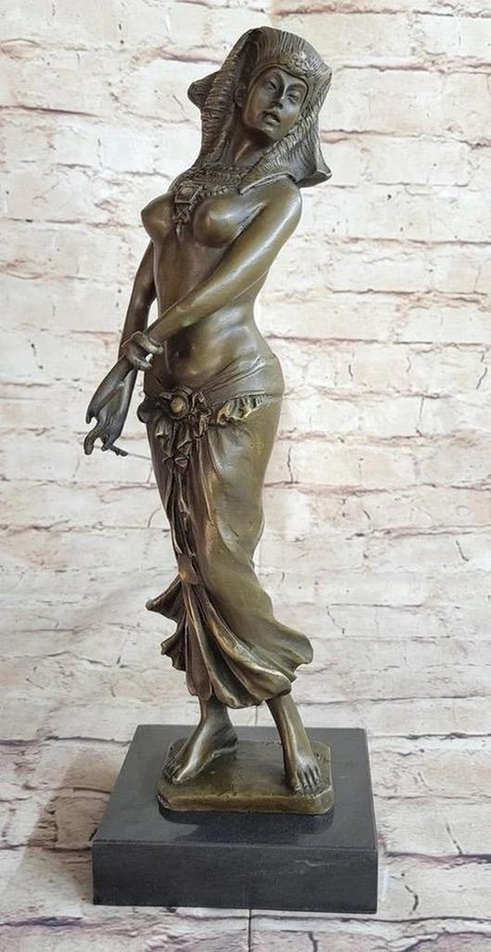 Egyptian Princess by The Nile Bronze Statue - 14" x 4": Egyptian Princess by The Nile Bronze Statue - 14" x 4" his Egyptian-inspired sculpture by renowned artist Aldo Vitaleh depicts a Royal Princess standing gracefully on the Nile. Adorn