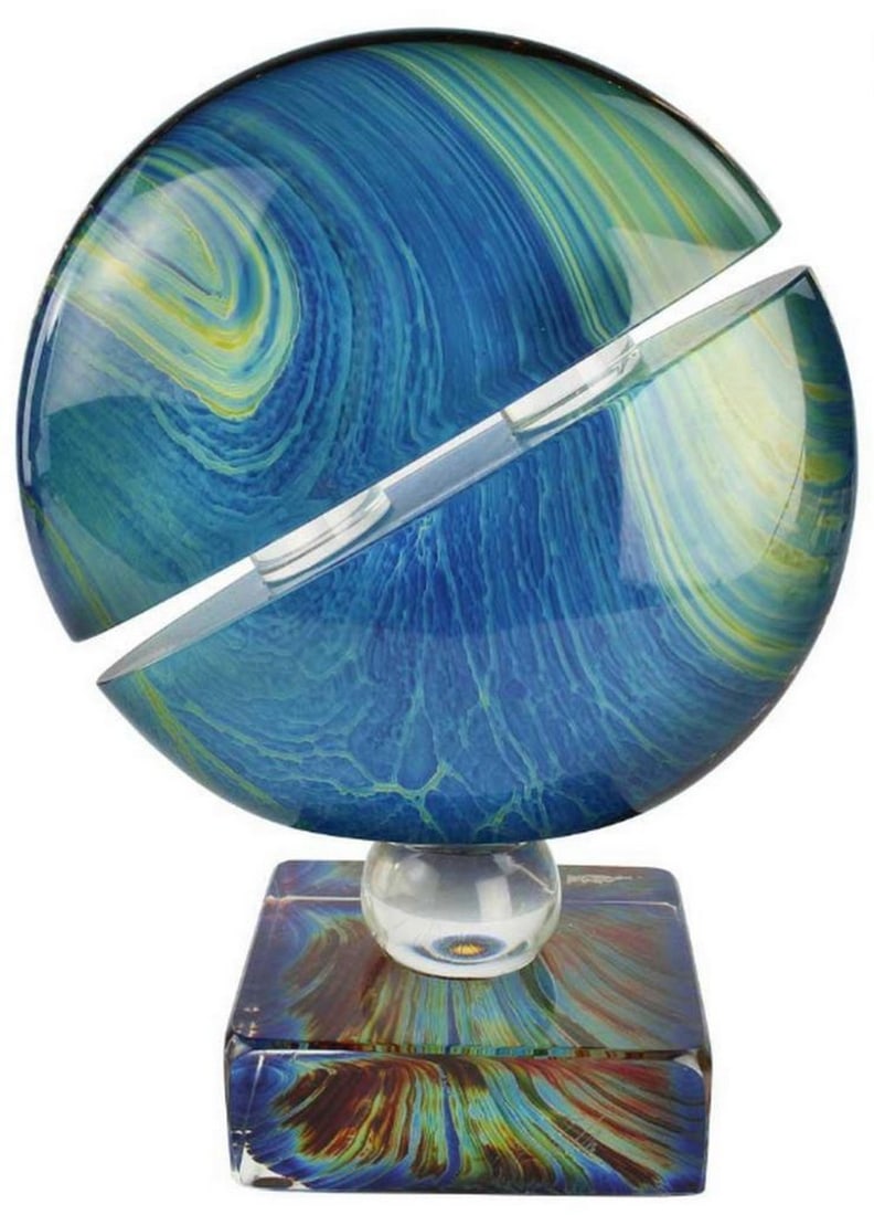 Saturno Chalcedony Sculpture Murano Glass: Saturno Chalcedony Sculpture Murano Glass This freehand-crafted sculpture is made from clear and chalcedony glass, a material notoriously challenging to create. Chalcedony glass combines traditional g
