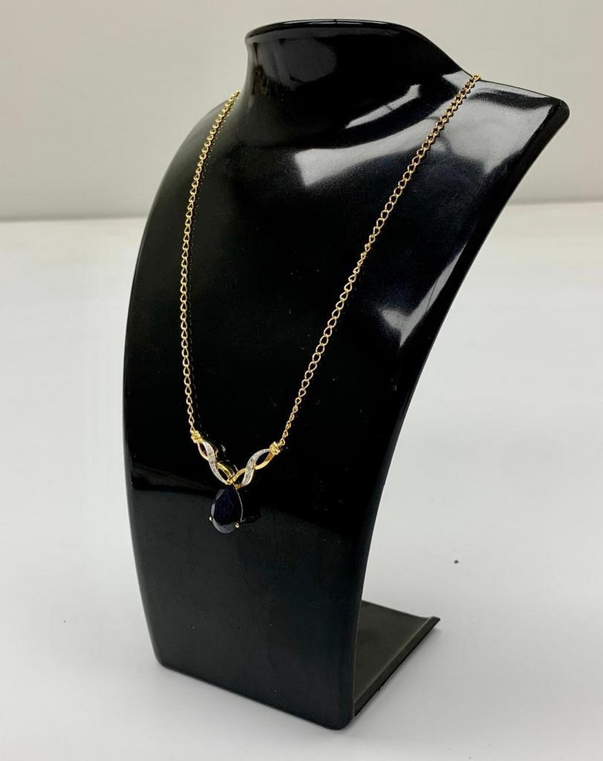 Ladies 6.05ct Tear Drop Cut Black Sapphire 18K Gold: Ladies 6.05ct Tear Drop Cut Black Sapphire 18K Gold Plated Necklace. For A Bold And Beautiful Look, This Black Sapphire Necklace Is The Perfect Choice. The Most Elegant Color Of Excellence Is Black; A