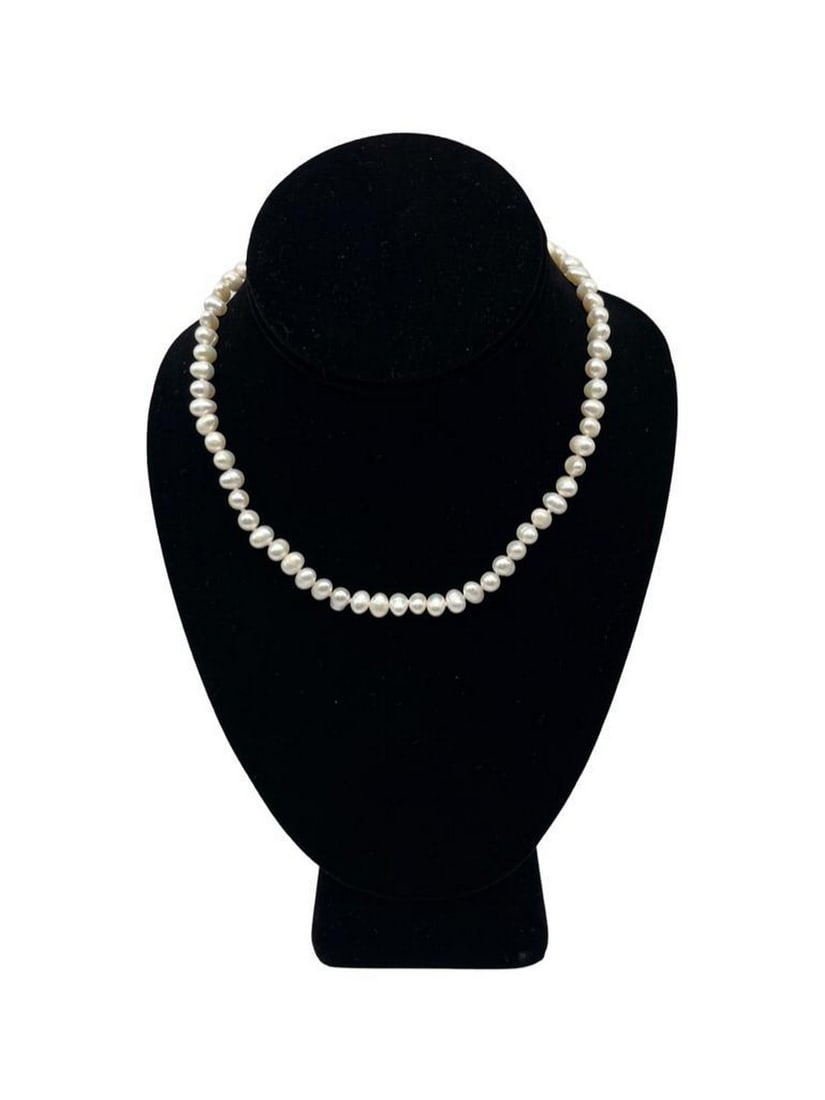 Genuine 16" Natural 5mm-6mm White Freshwater Pearl Necklace With Lobster Claw Clasp: Genuine 16" Natural 5mm-6mm White Freshwater Pearl Necklace With Lobster Claw Clasp. The Necklace Has A Pleasant Mother Of Pearl Shine To It. With Over 60+ White Freshwater Pearls & A Silv