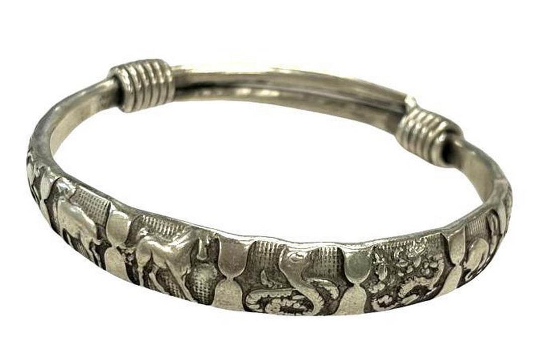 Handmade Tibetan Silver Chinese Zodiac Symbol Adjustable Bracelet: Handmade Tibetan Silver Chinese Zodiac Symbol Adjustable Bracelet The Chinese Zodiac is an ancient belief system considered to be a tool for deciding one's destiny. Following the traditional Chine