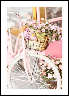 Pastel Pink Bike With Flower Basket Poster: Pastel Pink Bike With Flower Basket Poster Photograph of a pink bike with flowers in the basket. Create a pink and romantic feel in your home decor with this print. Perfect to add to the living room