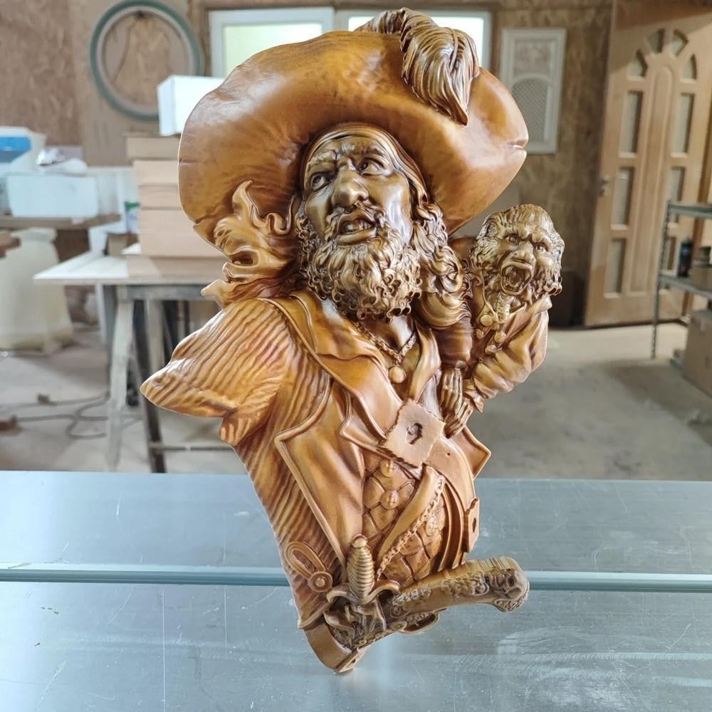 Pirate & Monkey Wood Carving: Pirate & Monkey Wood Carving Set sail for adventure with this masterfully carved Pirate & Monkey wood sculpture. Crafted from fine cherry wood, this detailed piece captures the rugged charm of