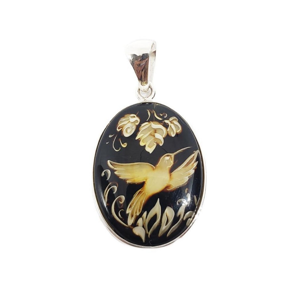 Intaglio Humming Bird Cognac Amber Cameo Pendant: Intaglio Humming Bird Cognac Amber Cameo Pendant This exquisite pendant features an intricately carved intaglio cameo of a hummingbird, meticulously crafted from warm cognac amber. The natural amber