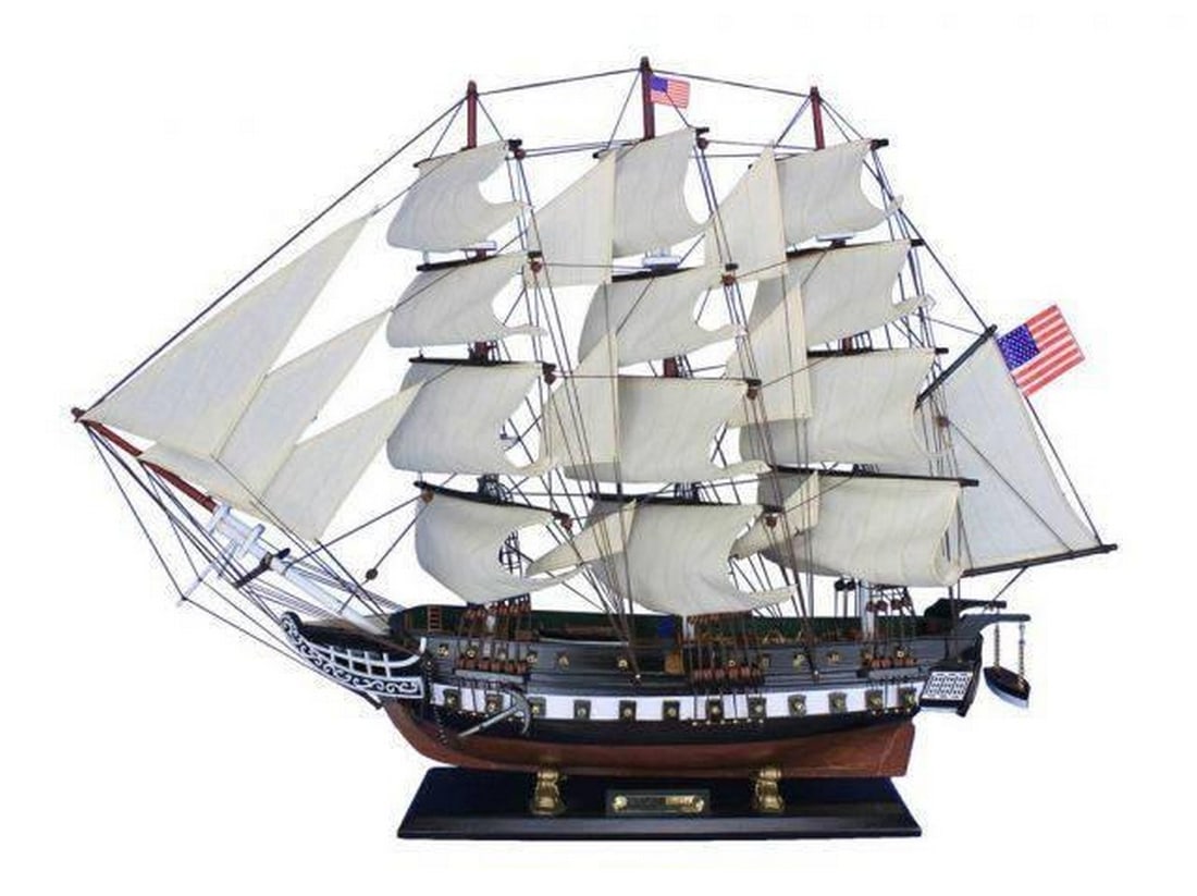 Wooden USS Constitution Tall Model Ship 32": Wooden USS Constitution Tall Model Ship 32" Fine craftsmanship and attention to detail highlight this scale tall model ship replica of “Old Ironsides”, the US Navy’s oldest and most fam