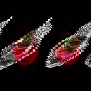 Sterling Silver & Synthetic Pink/Green Tourmaline Earrings: Sterling Silver & Synthetic Pink/Green Tourmaline Earrings These sterling silver earrings feature vibrant synthetic pink and green tourmaline stones, creating a striking contrast of colors. The d