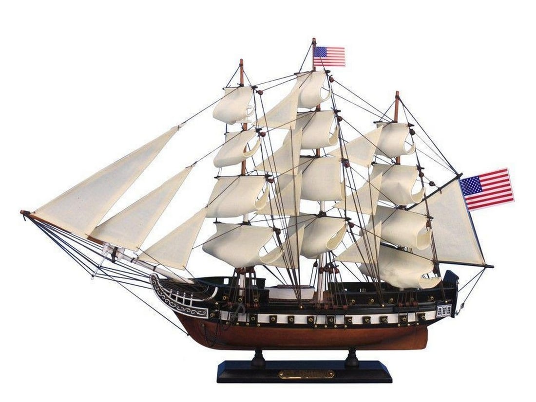 24" Wooden USS Constitution Tall Model Ship: Wooden USS Constitution Tall Model Ship 24" Fine craftsmanship and attention to detail highlight this scale tall model ship replica of “Old Ironsides”, the US Navy’s oldest and most fam