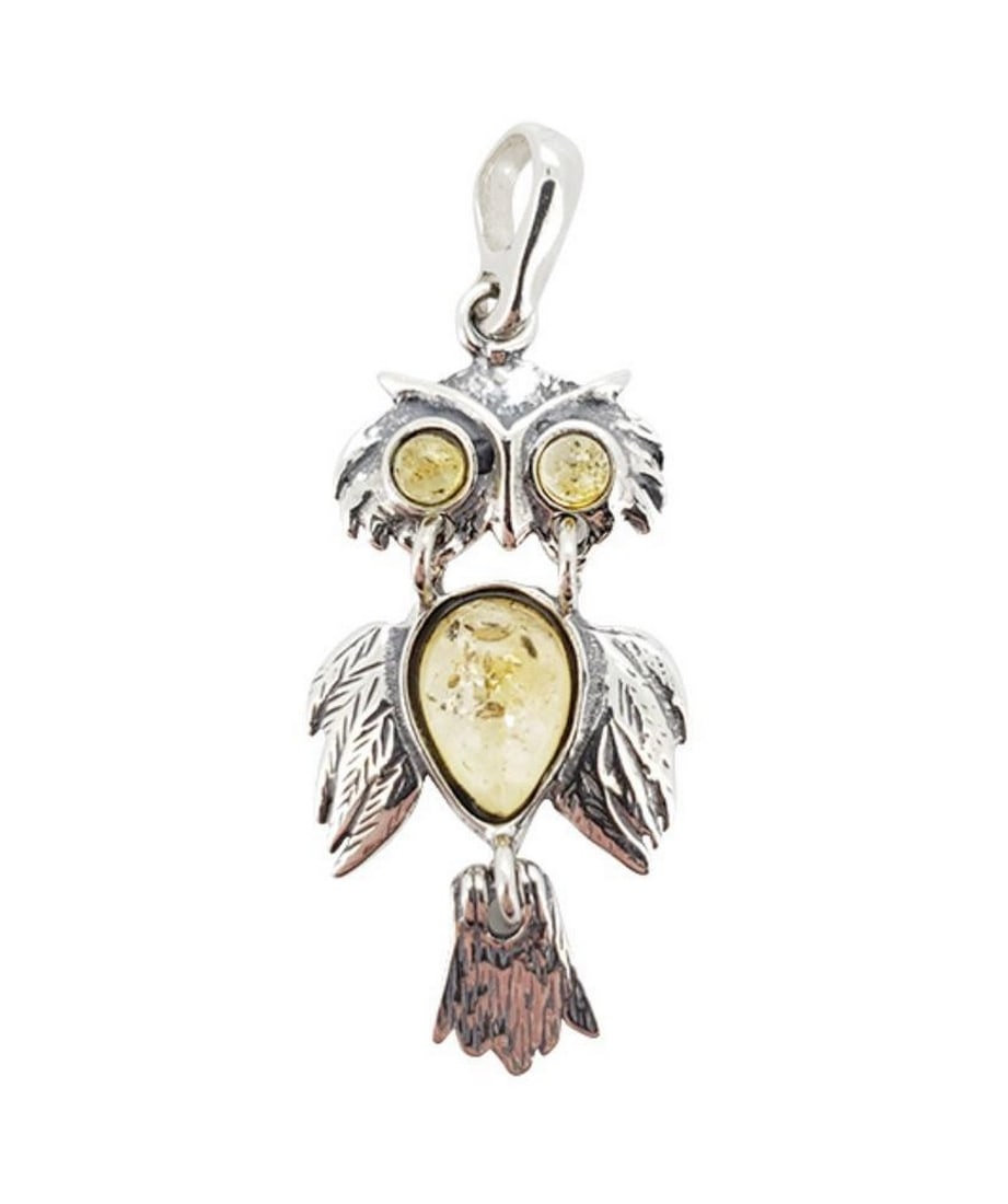 The Owl's Gaze Citrine Amber Necklace Pendant: The Owl's Gaze Citrine Amber Necklace Pendant This captivating piece marries the mystical charm of an owl with the radiant warmth of citrine and the timeless elegance of sterling silver. Its pier