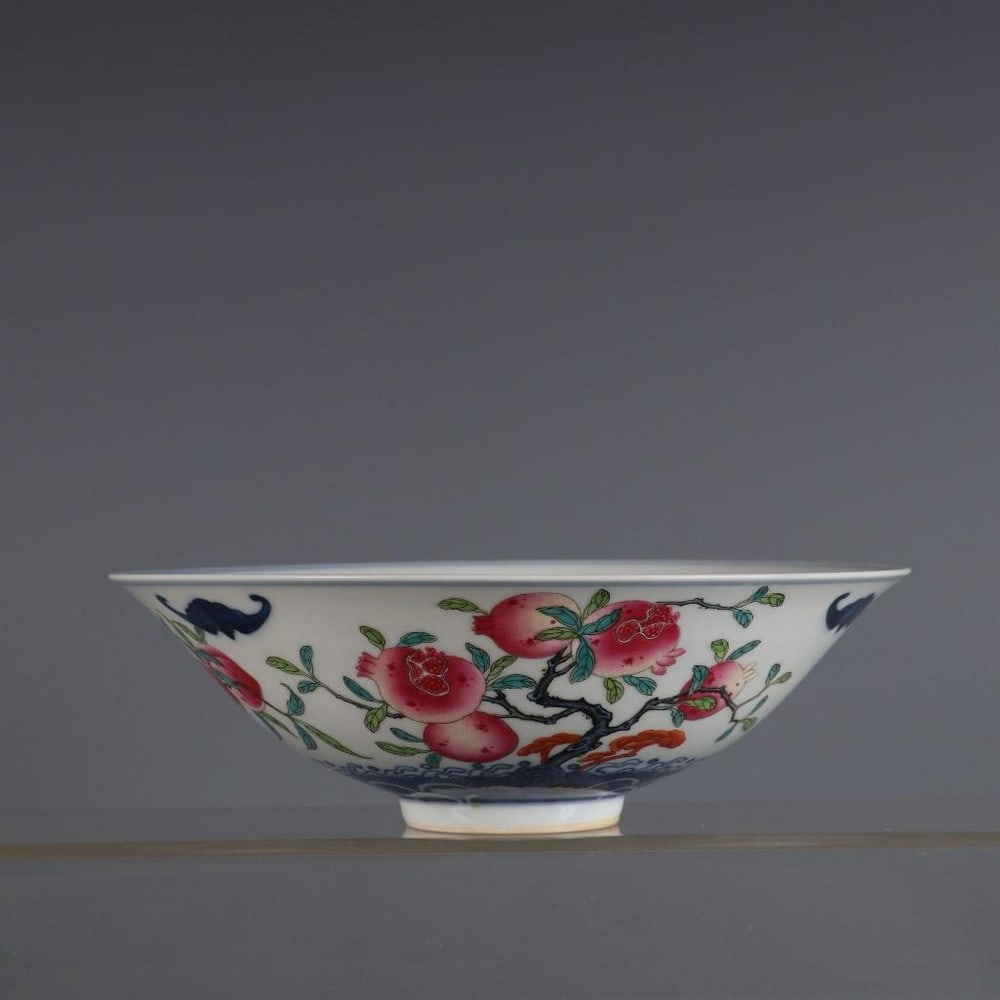 Qing Yongzheng Blue and White Famille Rose Three-Pattern Bowl: Qing Yongzheng Blue and White Famille Rose Three-Pattern Bowl A refined 18.5cm bowl from the Yongzheng period of the Qing Dynasty, featuring a harmonious blend of blue and white with famille rose acc